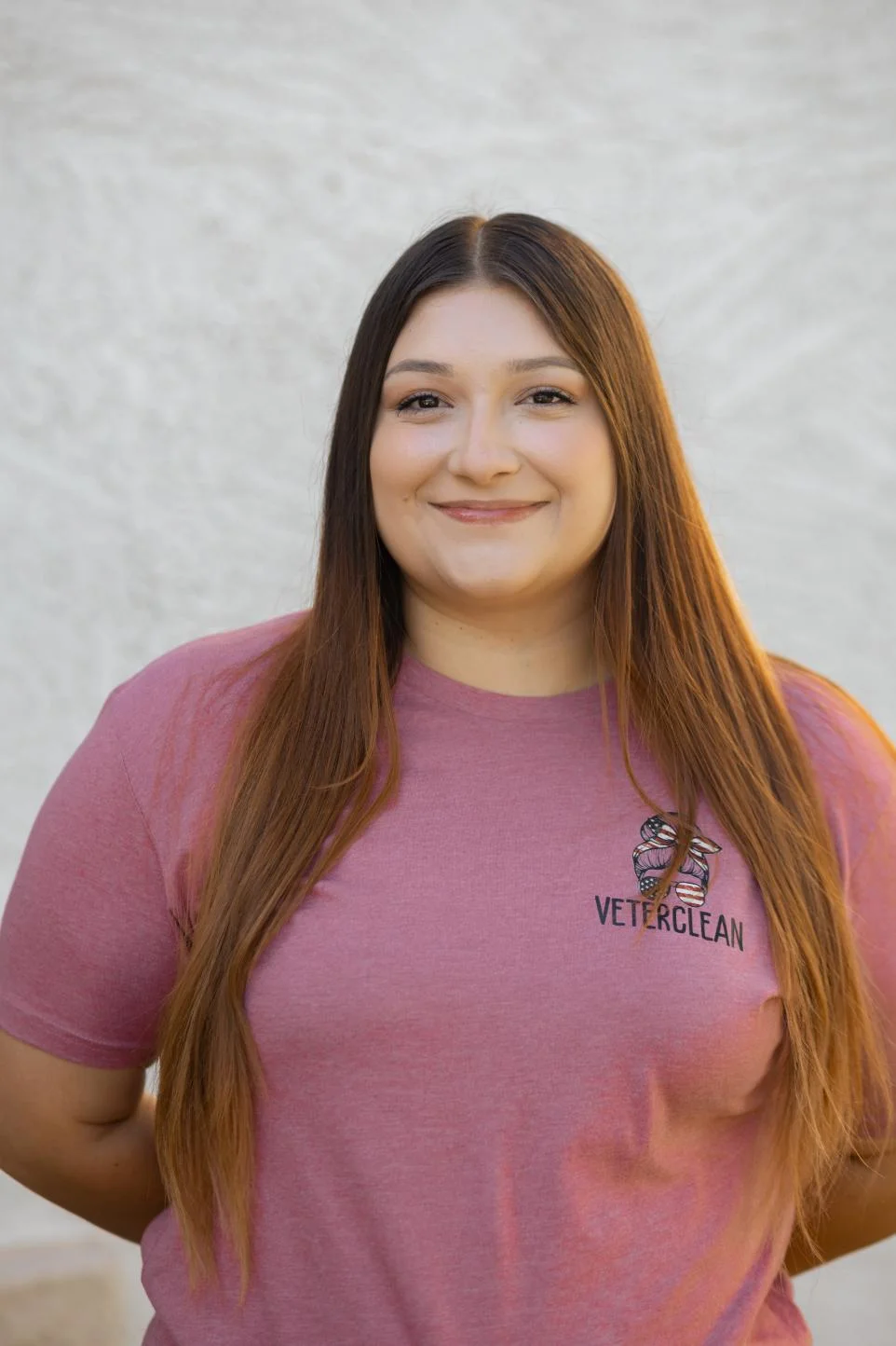 Tempe young professional relaxing in clean apartment instead of cleaning