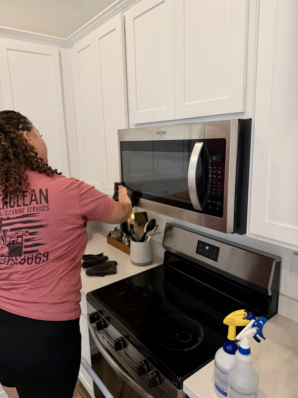 Rental kitchen appliance cleaning between short-term rental guests