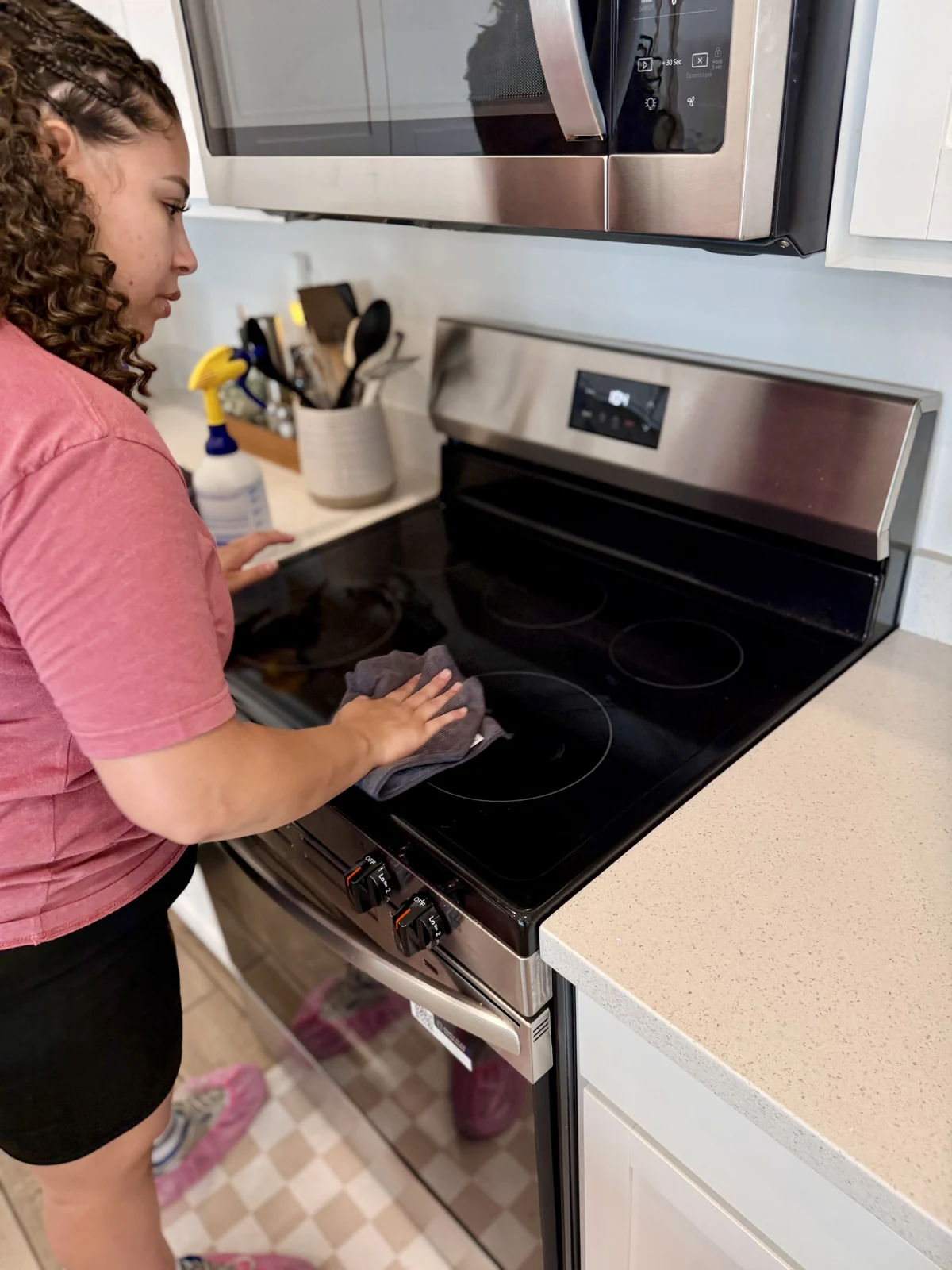 VeterClean cleaner working systematically on a stovetop in Gilbert AZ