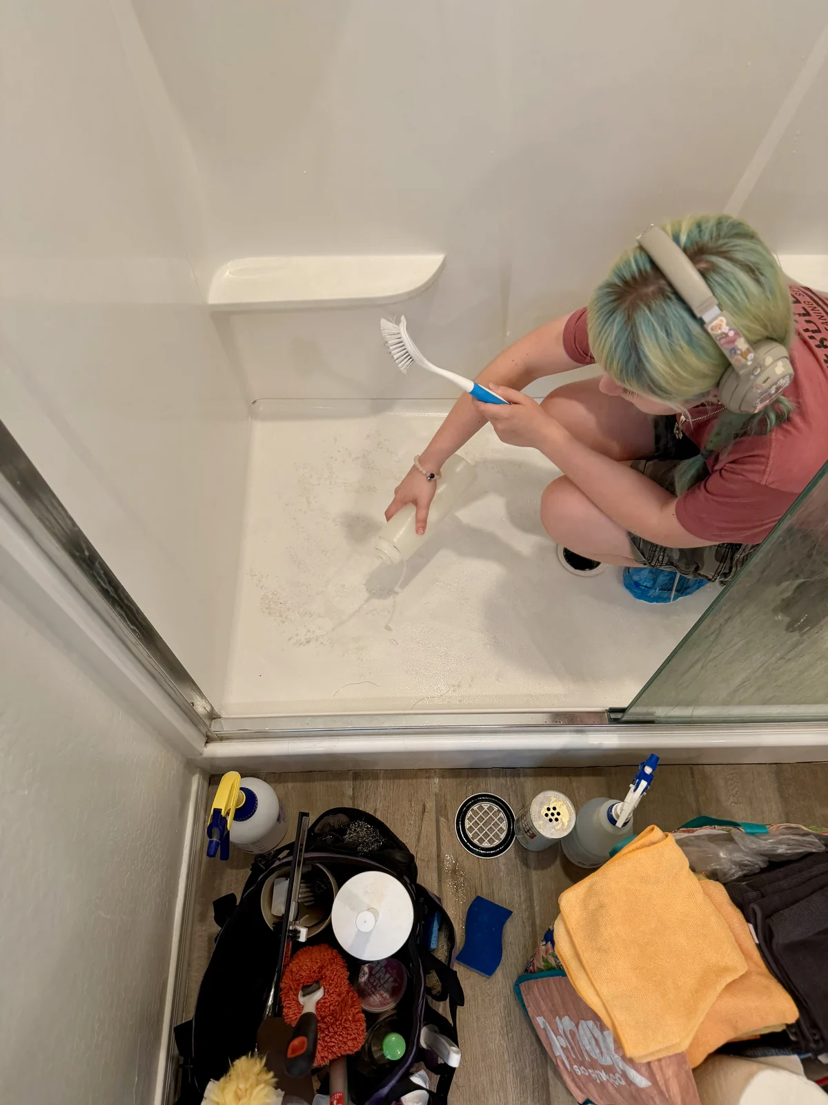 Detailed shower floor restoration during an East Valley deep clean