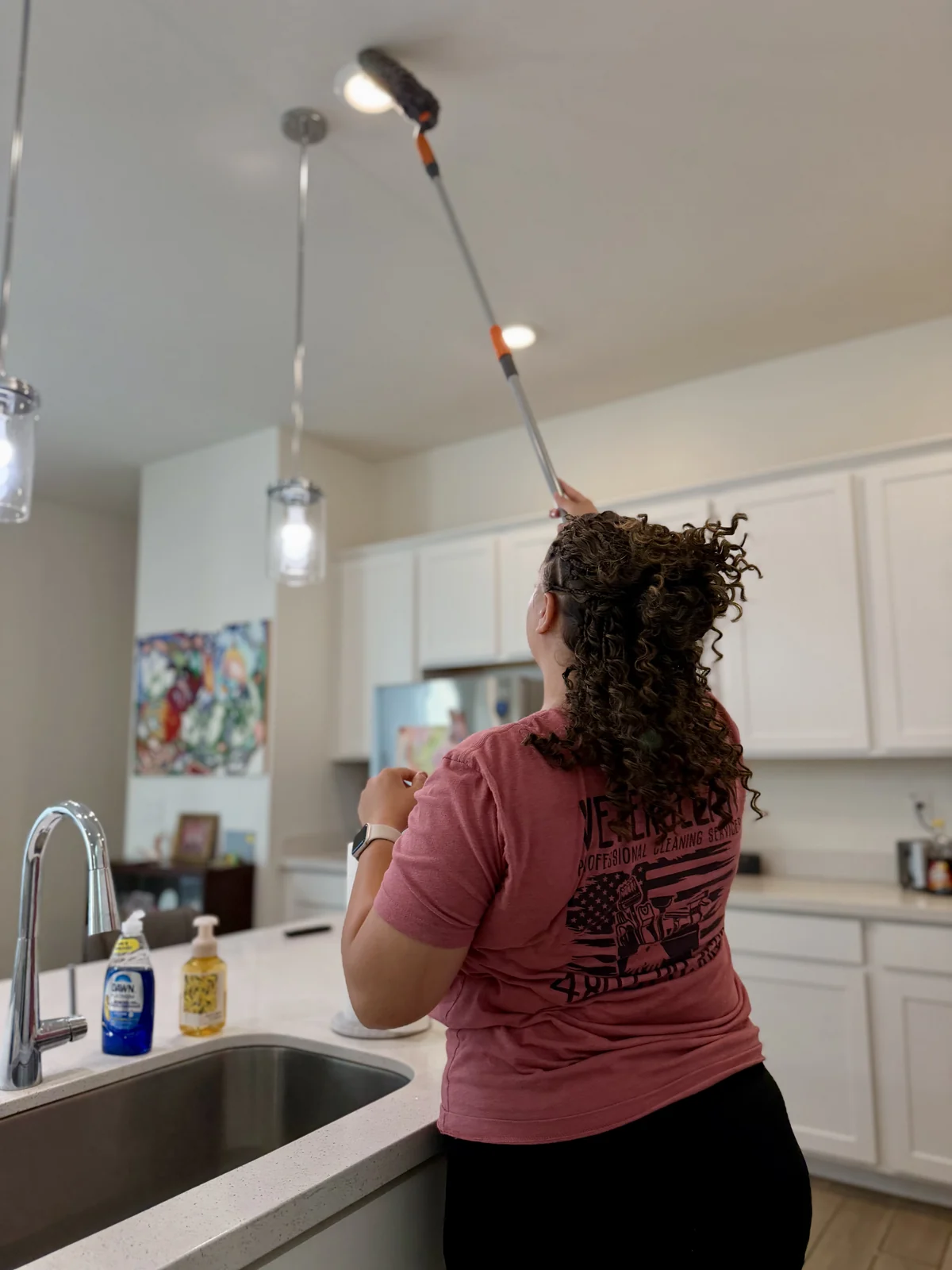 Background-checked VeterClean team member working in a client home